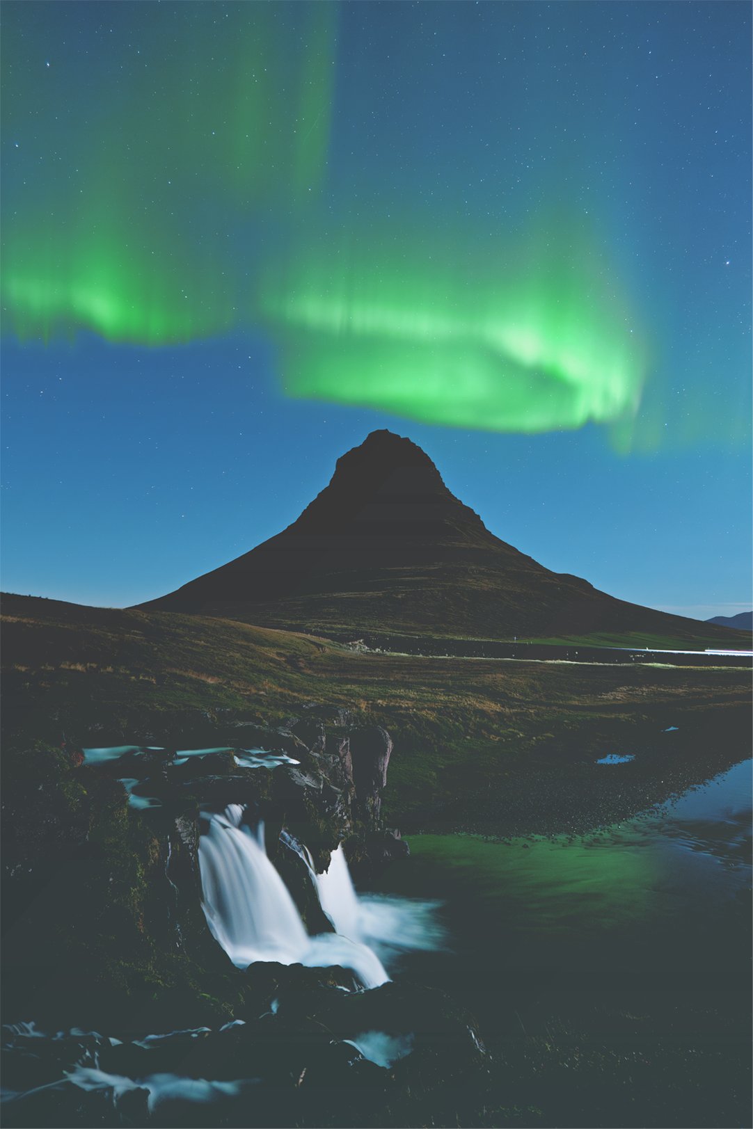 Northern lights over Kirkjufell mountain in Iceland